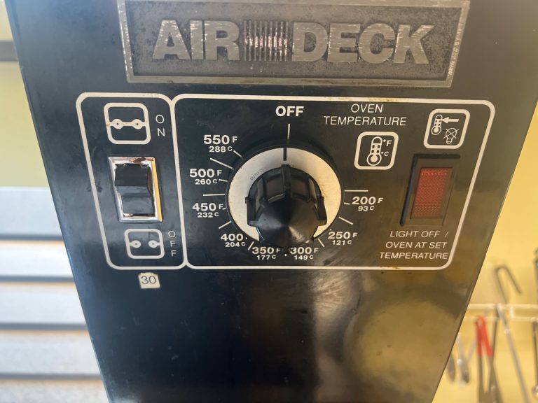 Garland Air Deck oven control panel showing OFF position on the temperature dial after thermostat replacement restored regulation