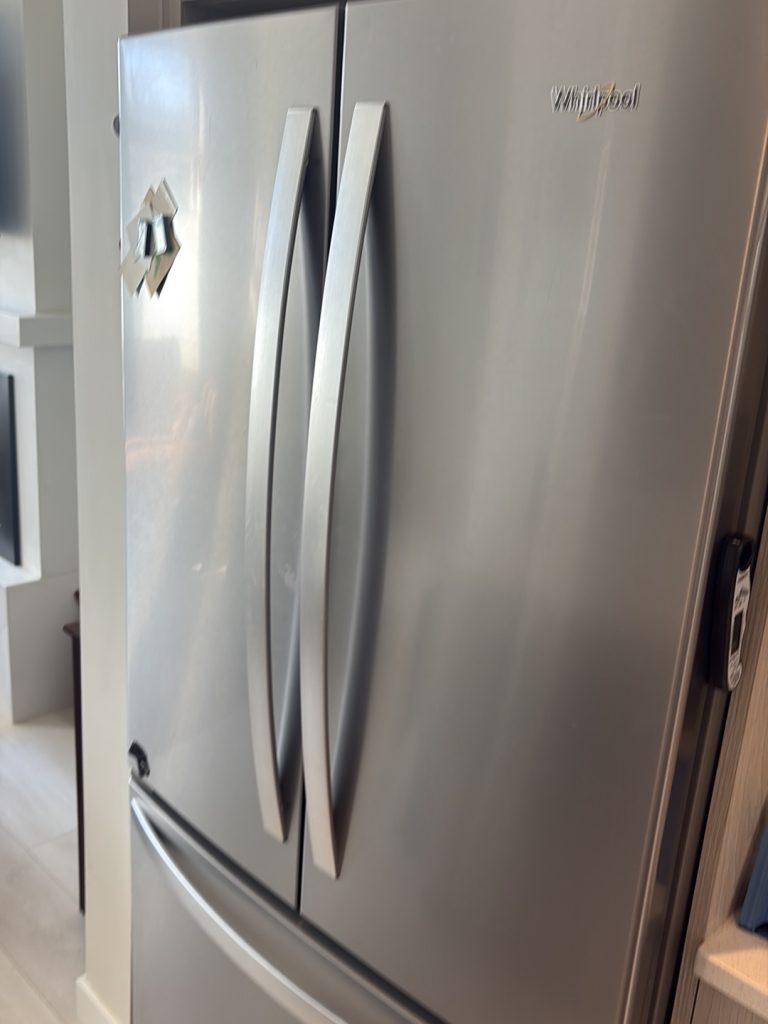 Whirlpool French door refrigerator restored after start relay replacement in a Killarney/Glengarry kitchen, Calgary