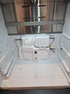 Replacement Bosch evaporator fan motor installed in B36CT refrigerator during service