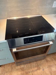 Bosch 800 Series induction cooktop with new OEM glass-ceramic top installed and powered up in Wrightville, Gatineau