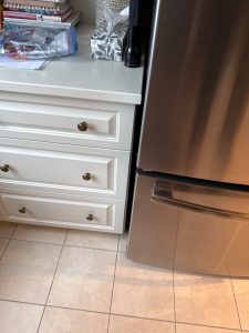 GE refrigerator water valve assembly area accessed for diagnostic in Centretown, Ottawa condo
