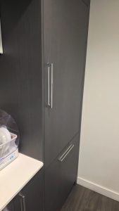 Bosch Benchmark built-in refrigerator machine compartment opened for condenser-side diagnostic in Brighouse, Richmond