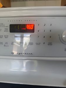 Frigidaire range control display showing a 350°F verification bake cycle after bake element replacement