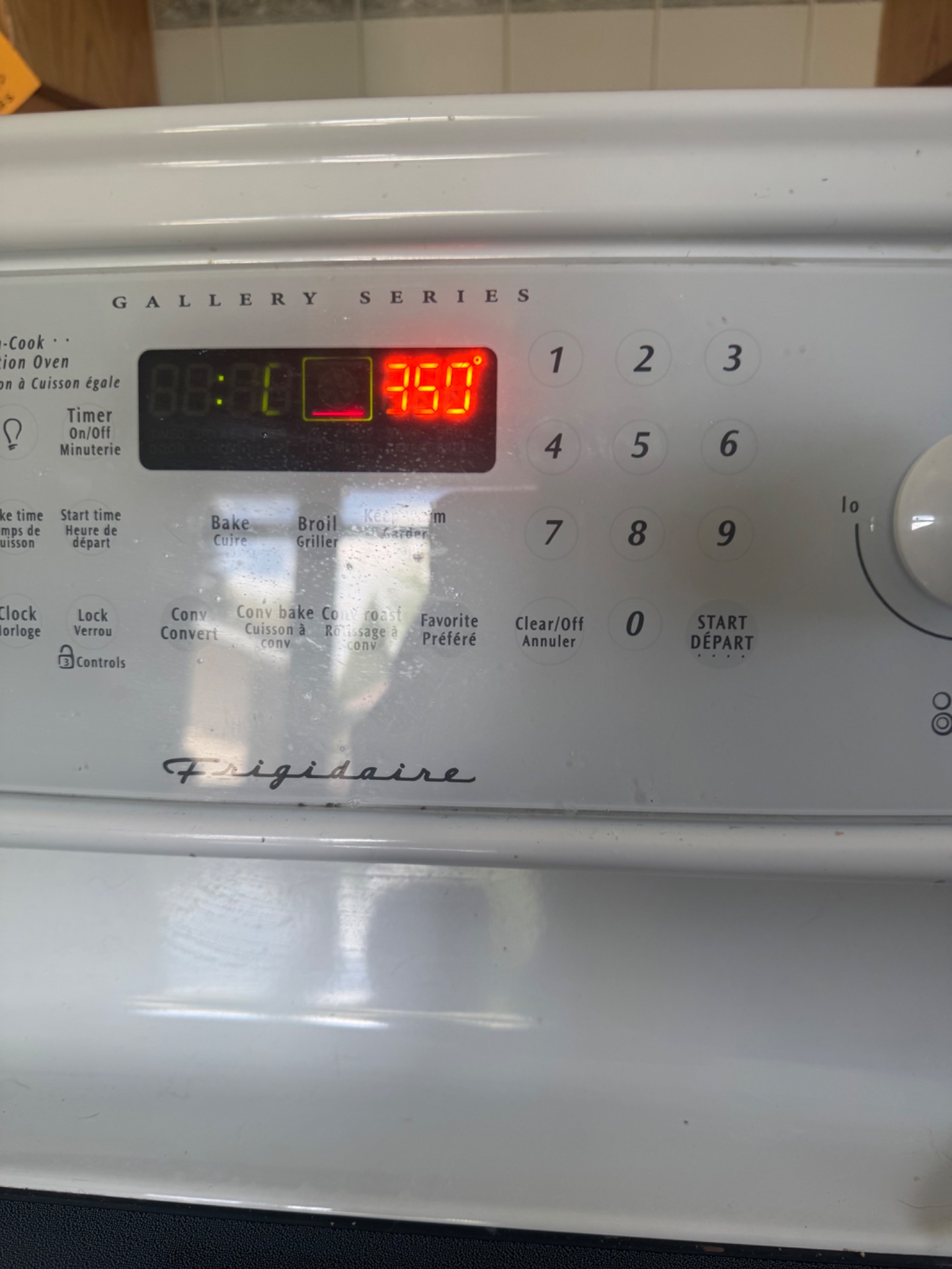 Frigidaire range control display showing a 350°F verification bake cycle after bake element replacement