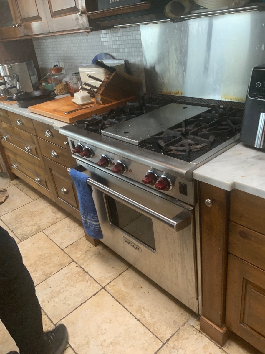 Wolf 827647 OEM oven thermostat replacement installed on the R364G gas range, returning the control circuit to honest operation