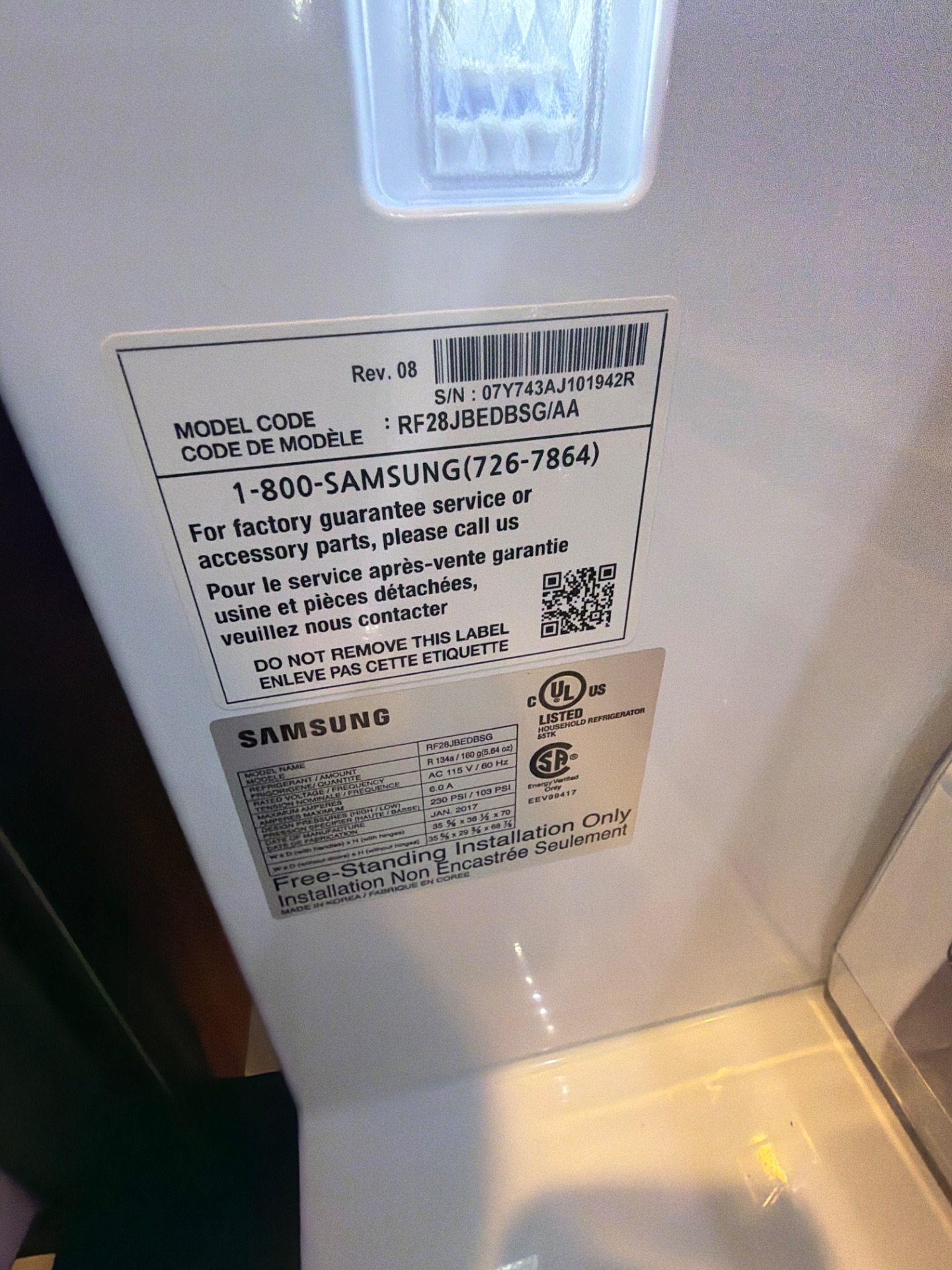 Samsung RF28JBEDBSG model and serial label confirmed during ice maker diagnosis in Airdrie, AB