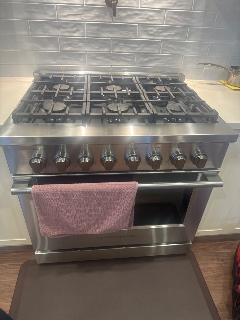 Fisher & Paykel RGV3-366-N 36-inch stainless gas range in a Central Burnaby kitchen before repair