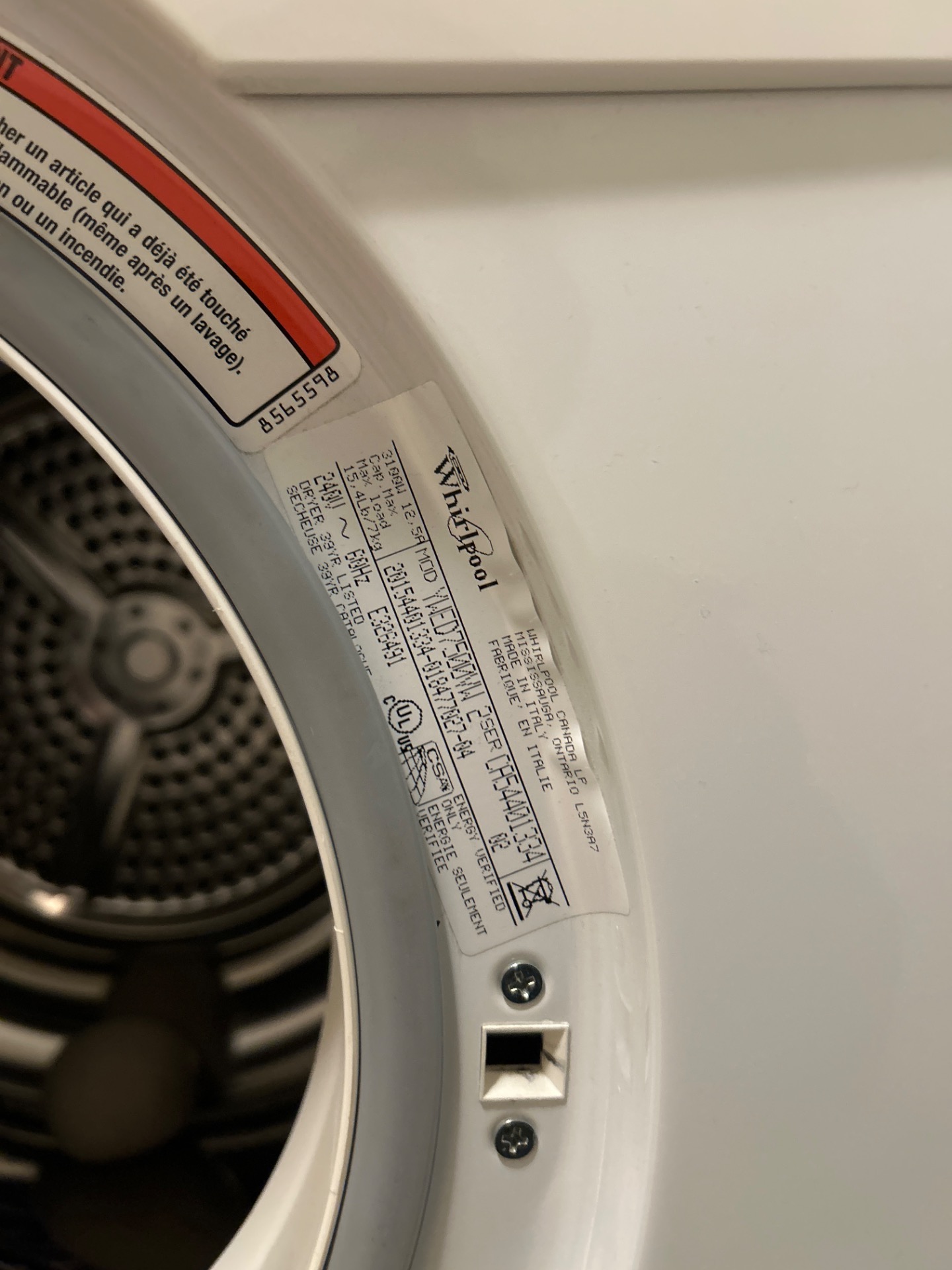 Whirlpool dryer model YWED7500VW nameplate confirmed during a Beltline service visit in Calgary