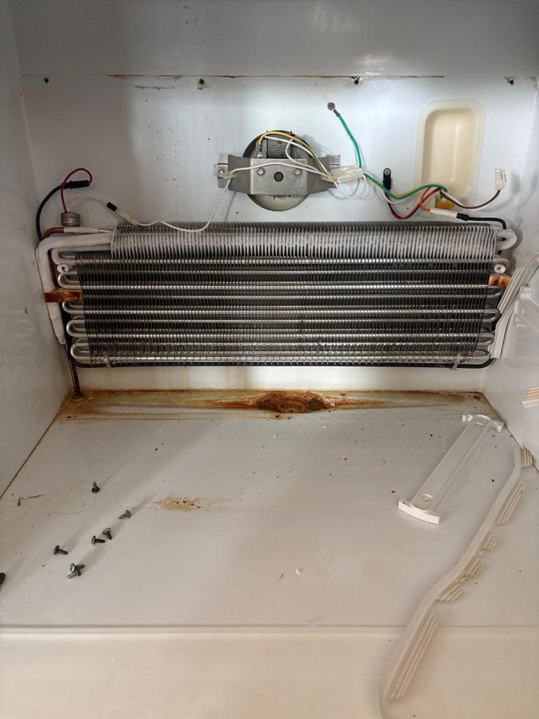 Frigidaire refrigerator evaporator compartment opened during thermistor and control board diagnosis by TechVill in Aspen Woods, Calgary