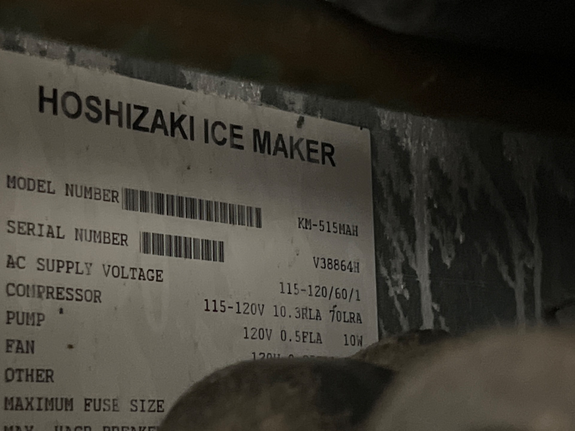 Defrosting the iced evaporator on a Hoshizaki KM-515MAH commercial ice maker during service