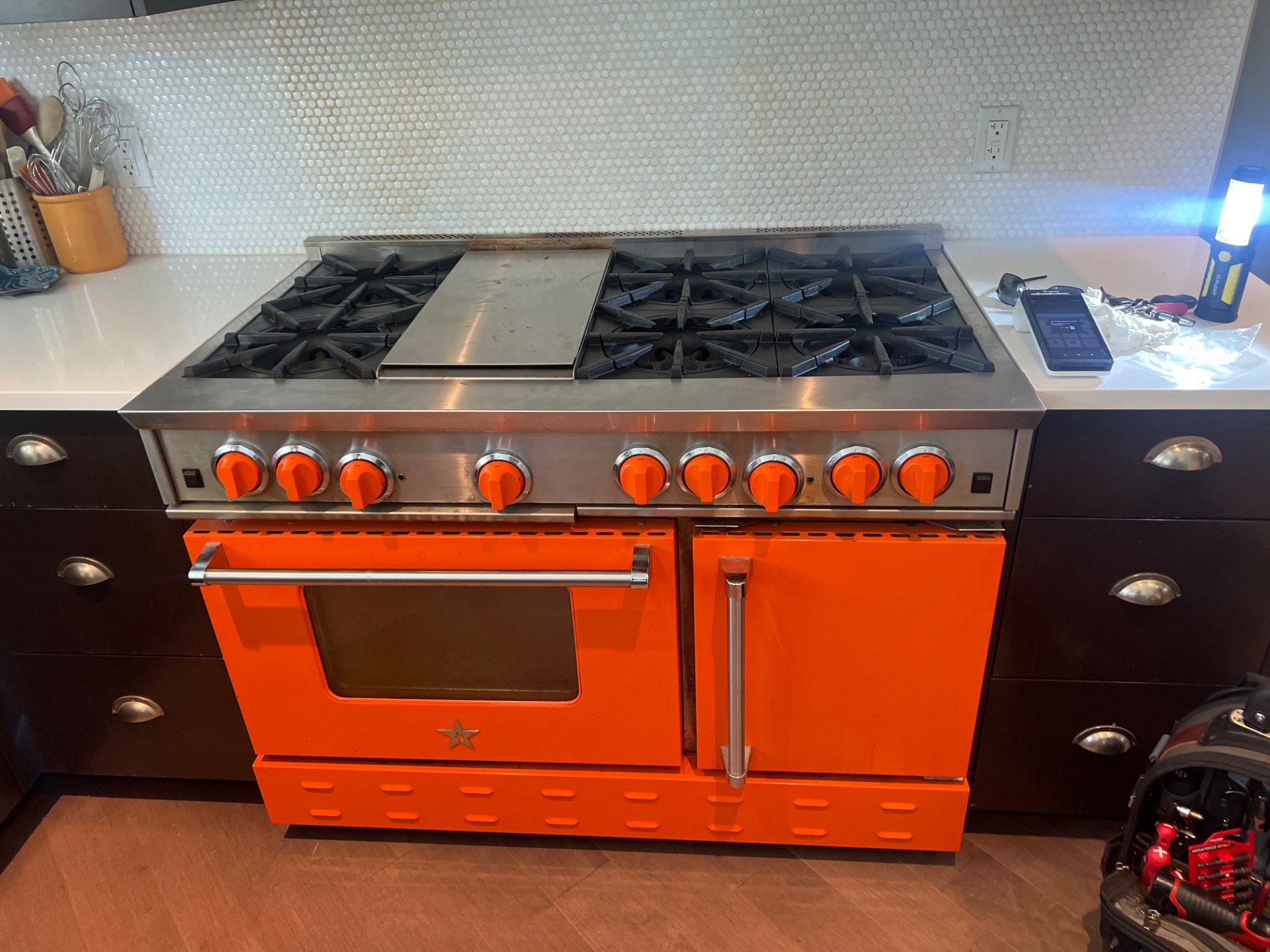 Gas leak inspection on a BlueStar gas range after burner valve replacement in Parkland Calgary