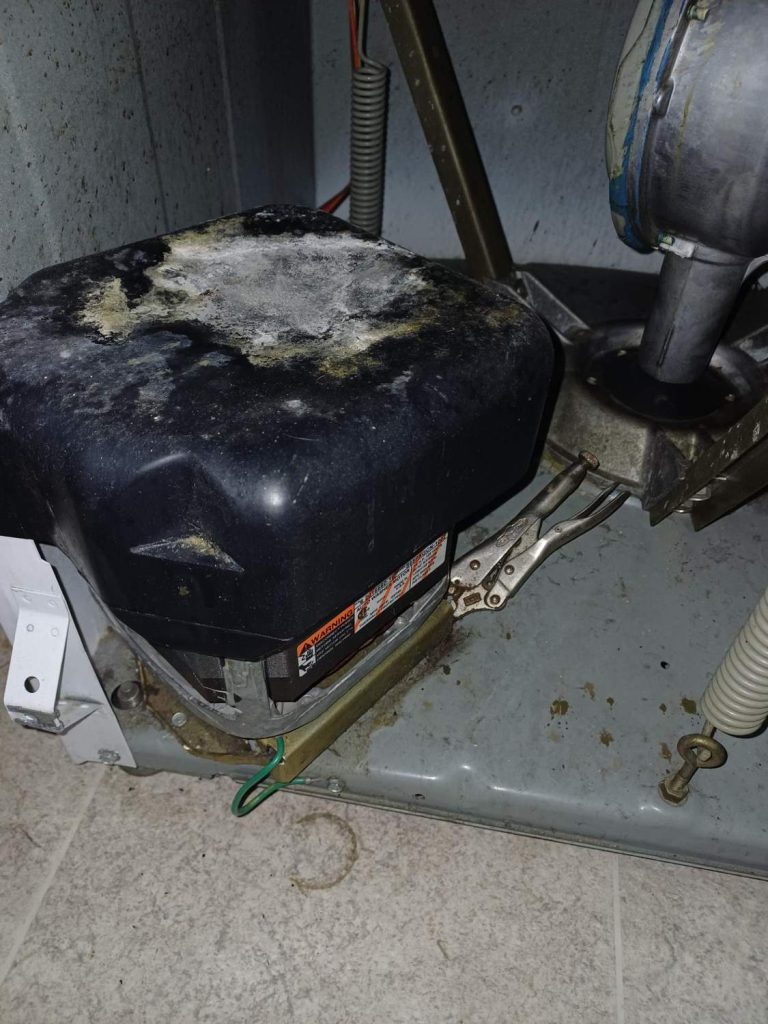 Failed drive motor removed from a vintage Maytag Dependable Care washer in Dover, SE Calgary