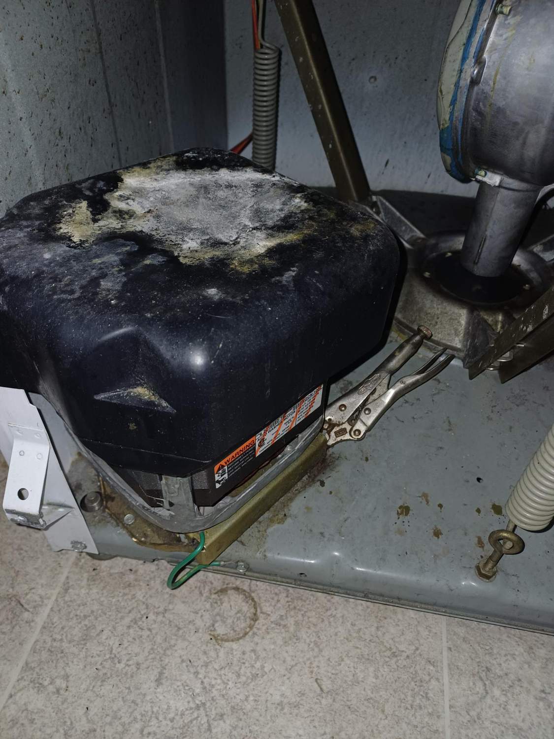 Failed drive motor removed from a vintage Maytag Dependable Care washer in Dover, SE Calgary