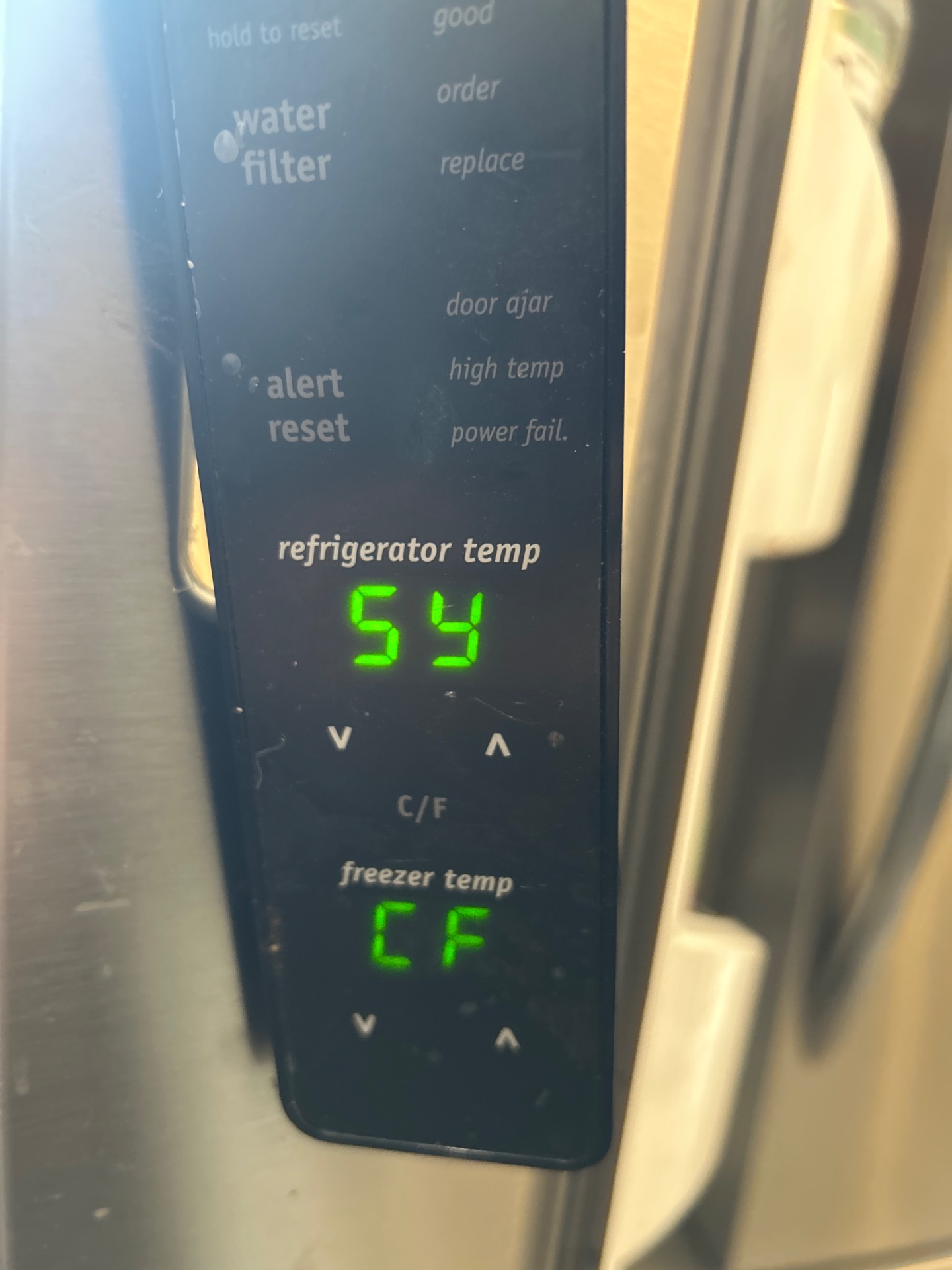 Accessing the control boards on a Frigidaire refrigerator during a De Winton service call