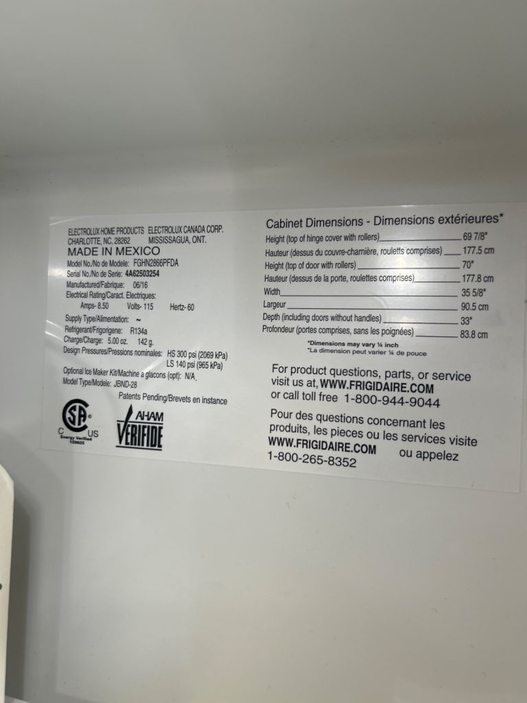 Unresponsive control panel on a Frigidaire refrigerator being diagnosed by TechVill in De Winton