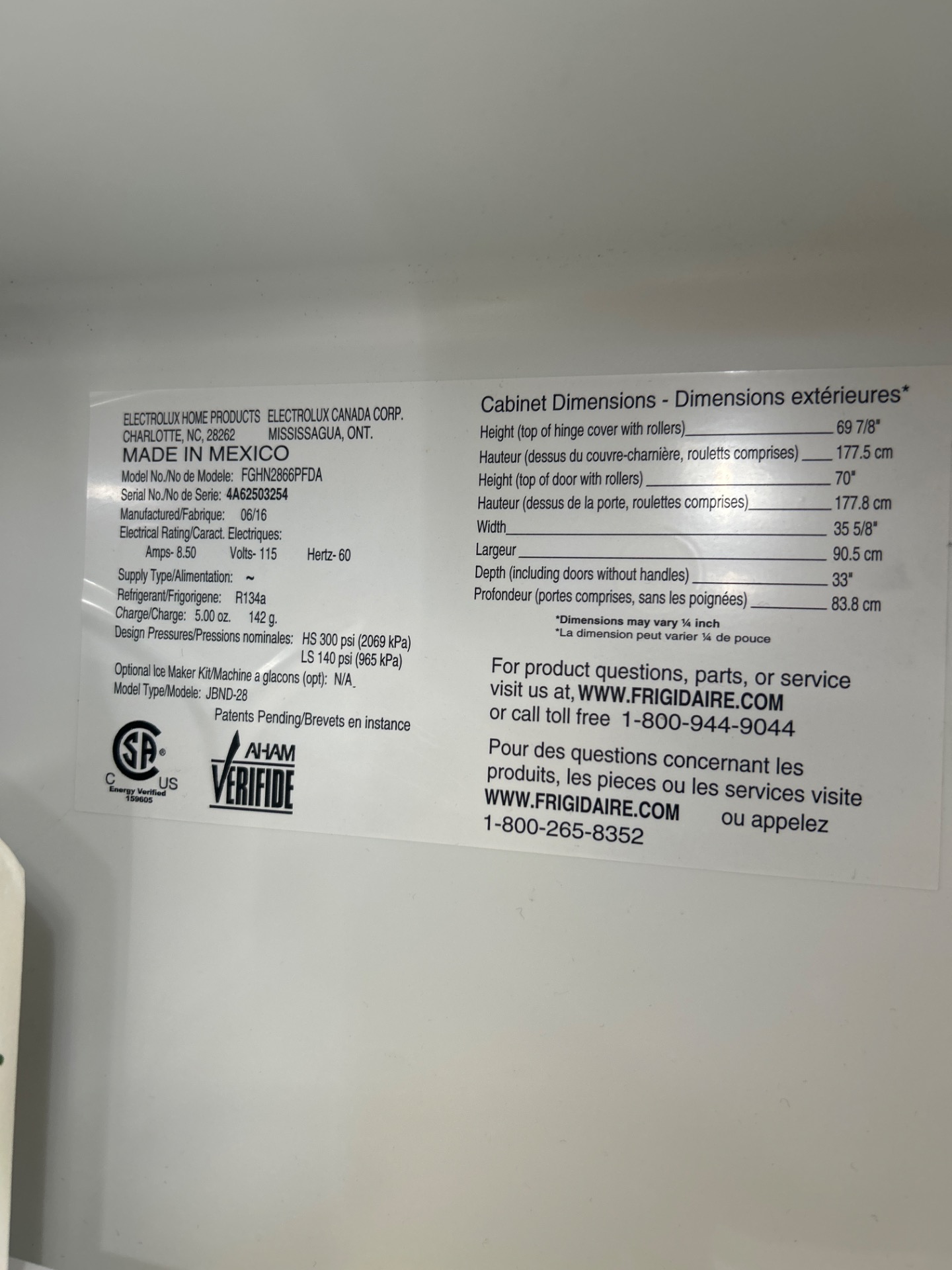 Unresponsive control panel on a Frigidaire refrigerator being diagnosed by TechVill in De Winton