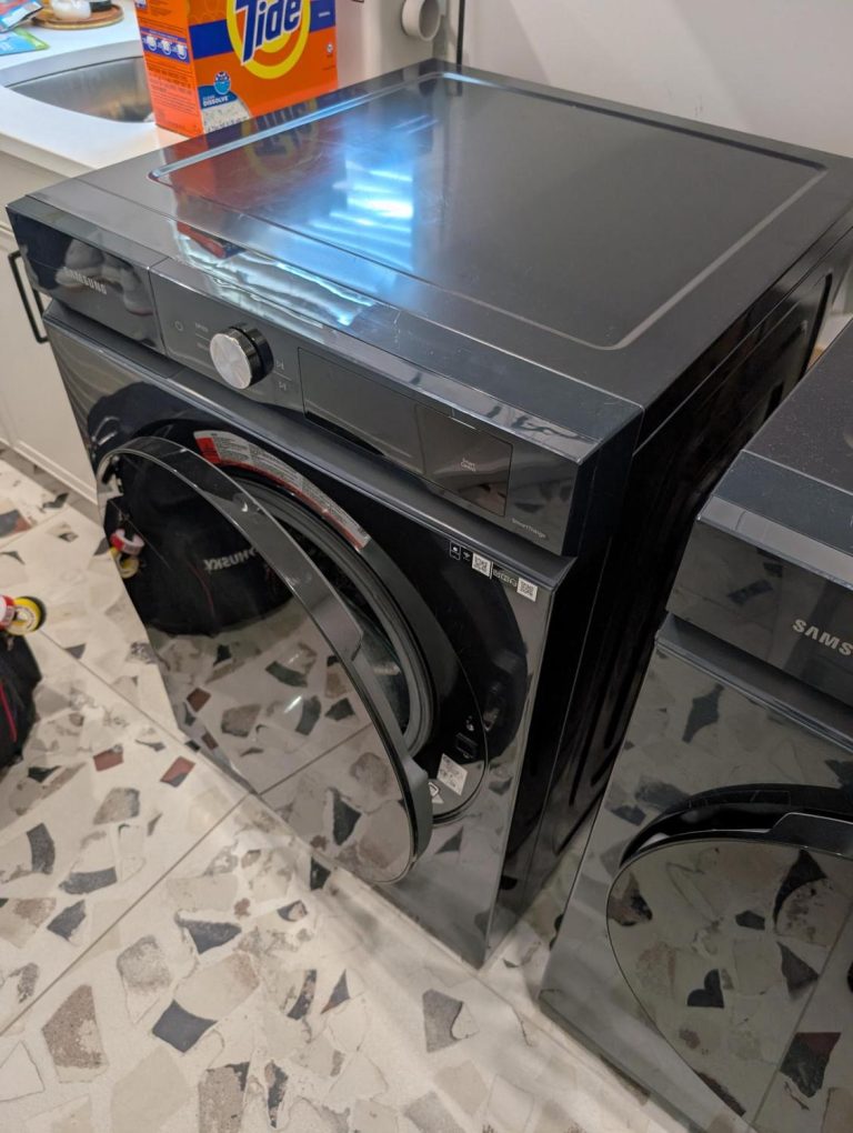 Samsung WF46 front-load washer and matching dryer in a Terwillegar, Edmonton laundry room