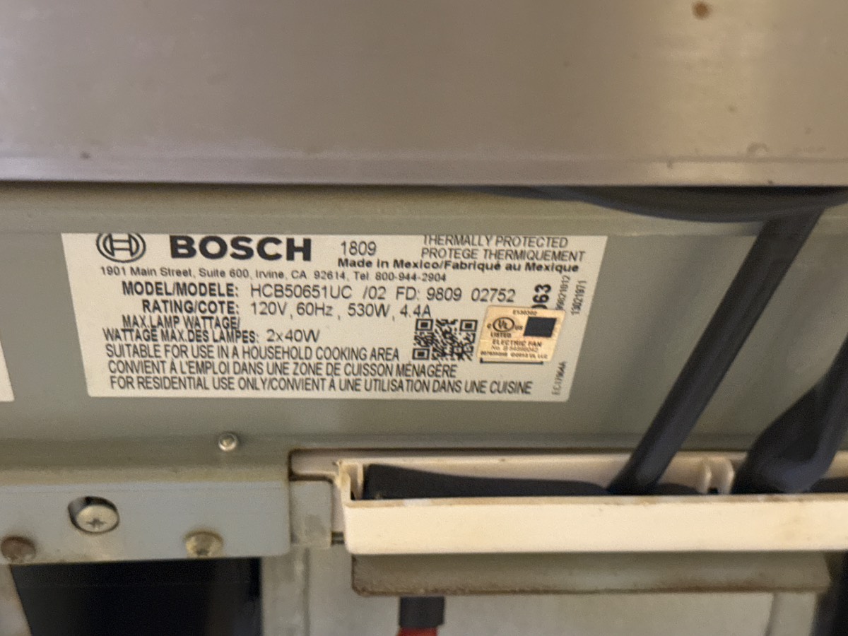 Blower motor access on a Bosch under-cabinet range hood during an Ottawa service call