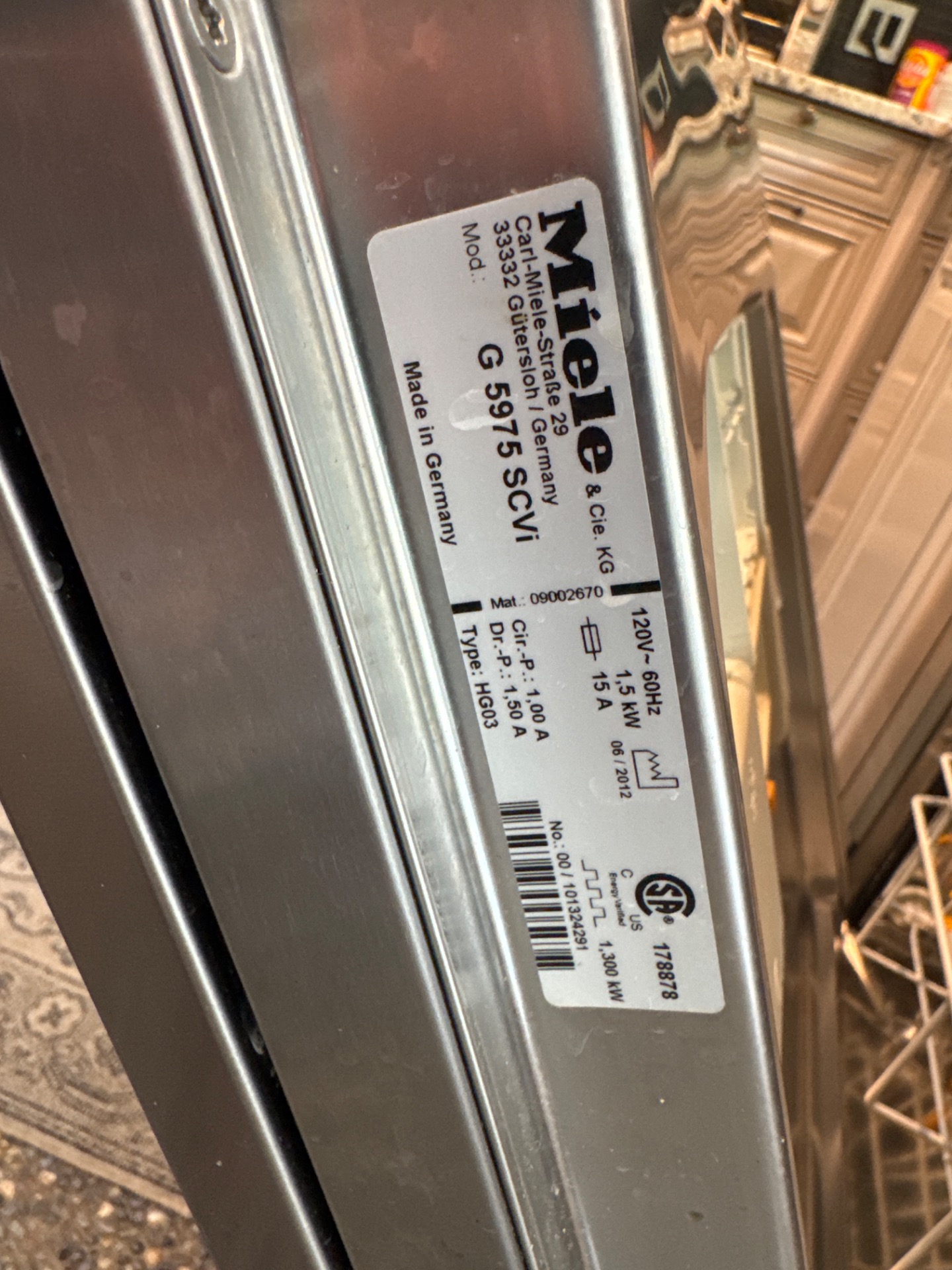 Miele rating plate confirming model G 5975 SCVi and serial number on a dishwasher in Shaughnessy, Vancouver