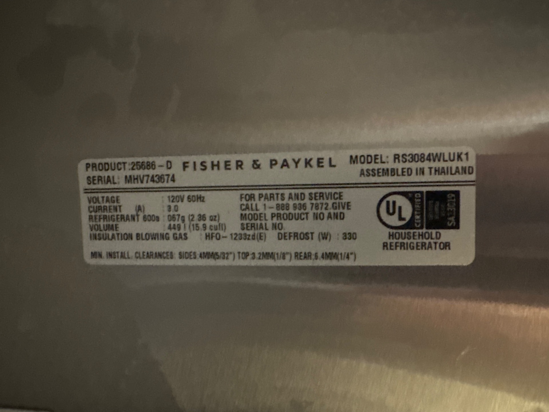 Accessing the drain system on an integrated Fisher & Paykel column refrigerator in Mount Pleasant Vancouver