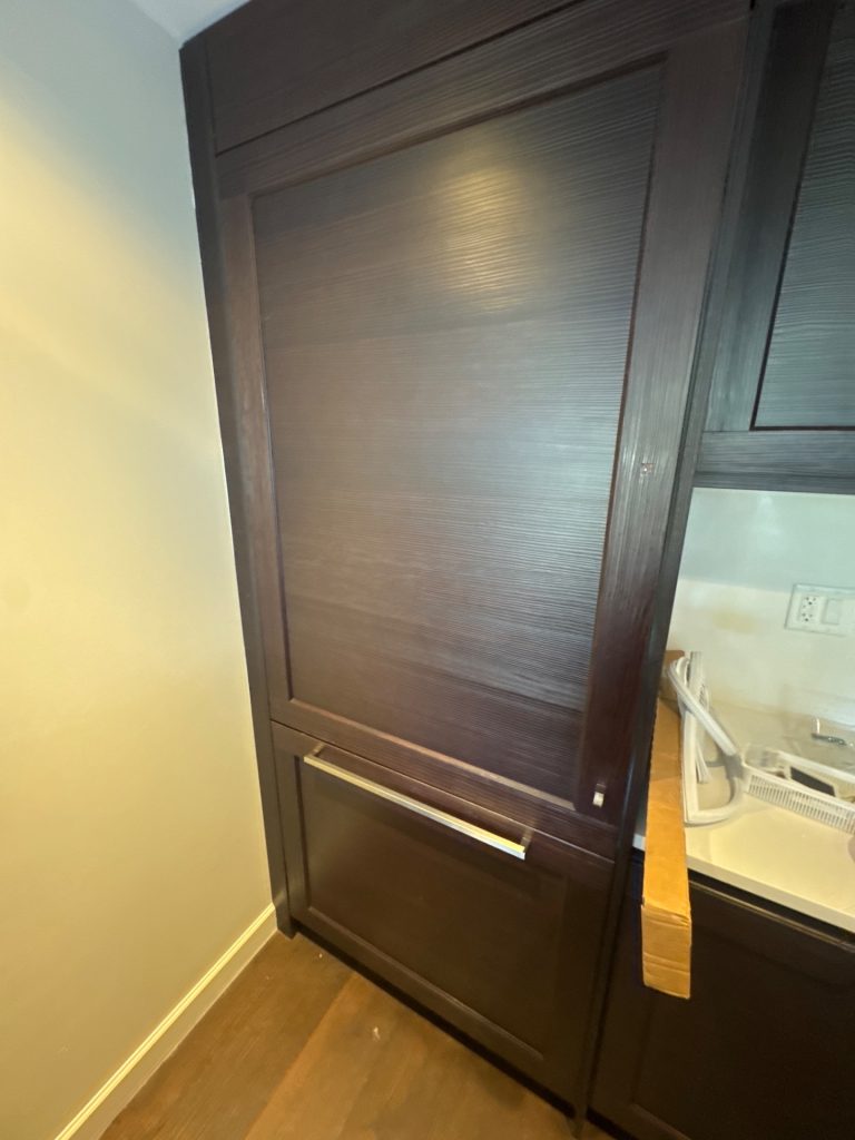 TechVill technician replacing the freezer door gasket on a Gaggenau built-in refrigerator in Vancouver