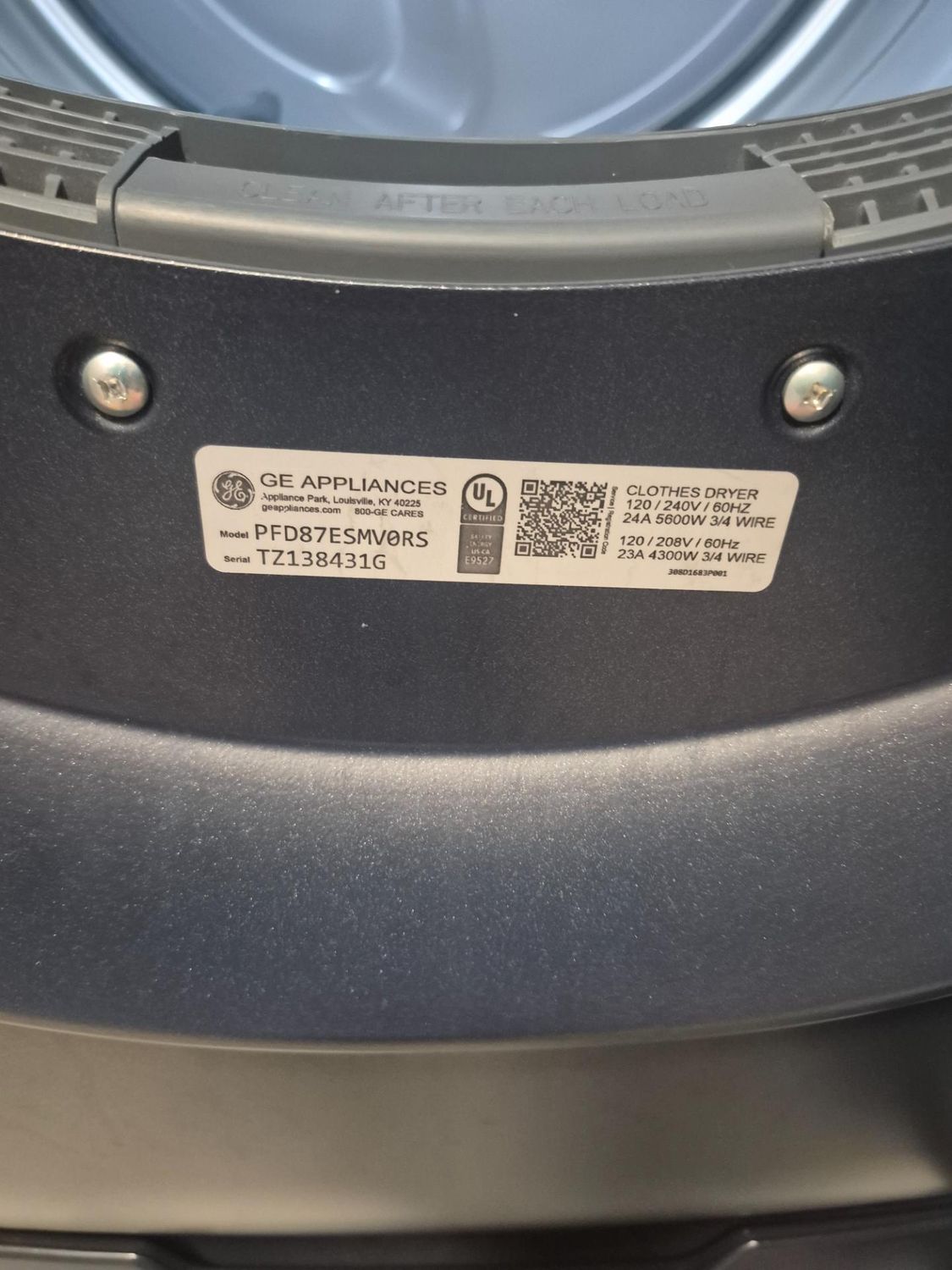 GE Appliances nameplate showing dryer model PFD87ESMV0RS during the NW Winnipeg service call