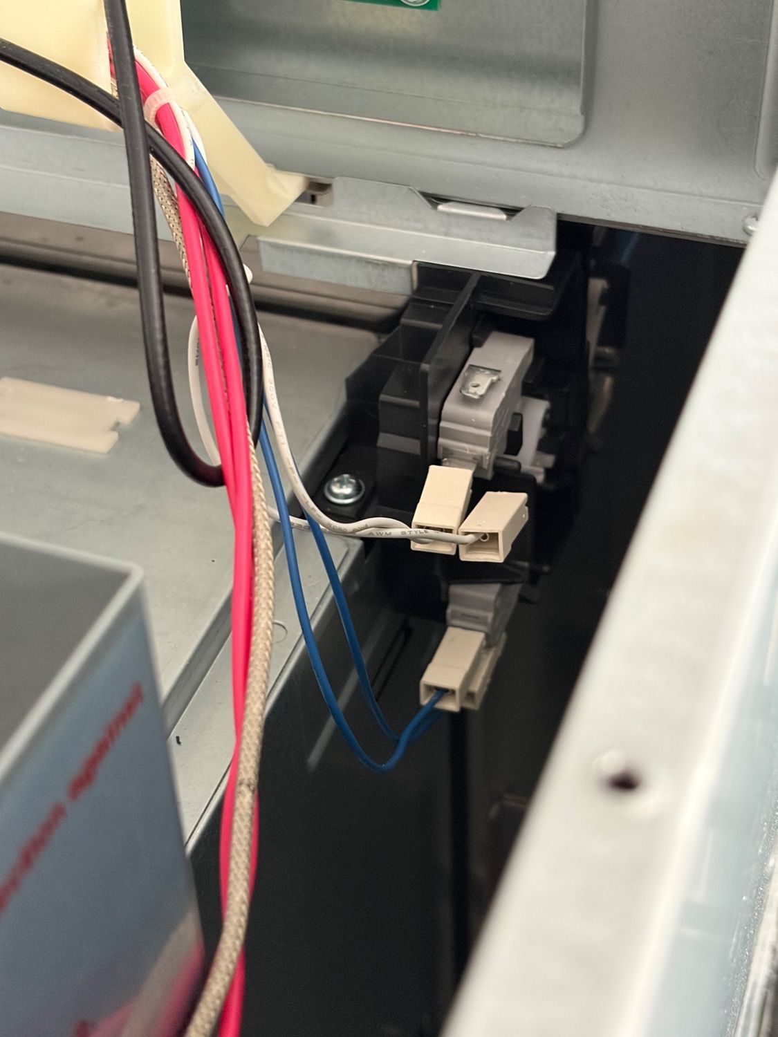 Door interlock switch area of the Bosch microwave inspected during the TechVill visit near Bearspaw