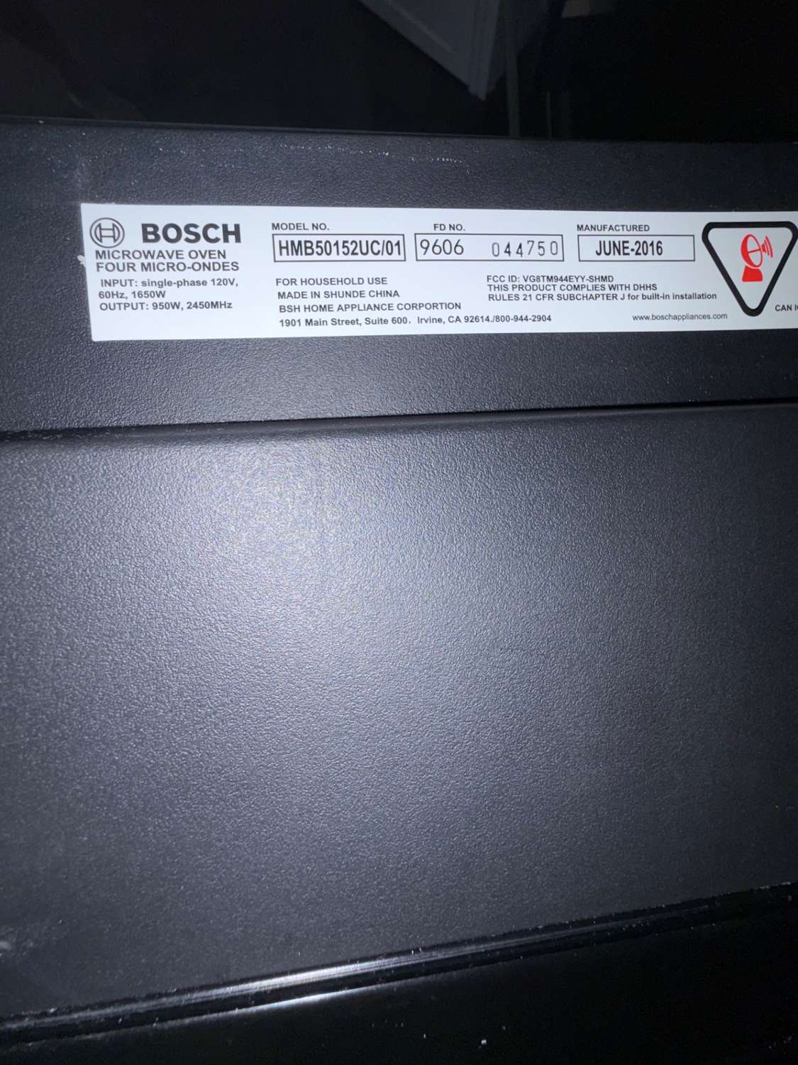 Bosch HMB50152UC microwave oven model plate photographed during service in west Calgary