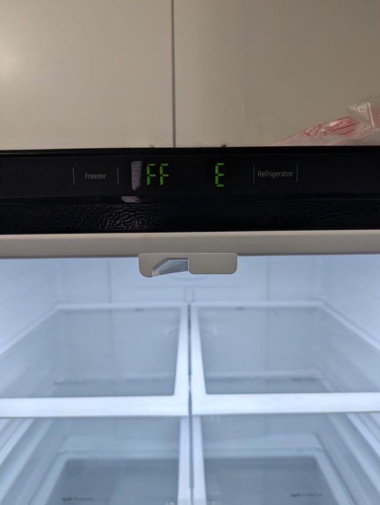 LG refrigerator display showing the FF E error code for an evaporator fan fault in Windermere, Edmonton