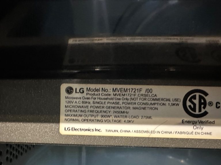 LG MVEM1721F over-the-range microwave model plate photographed during TechVill diagnosis in Surrey, BC