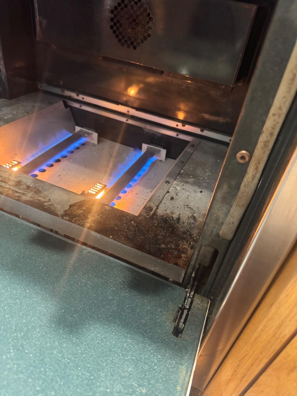 Viking gas oven burners burning a clean blue flame after glow and spark igniter replacement in west Calgary