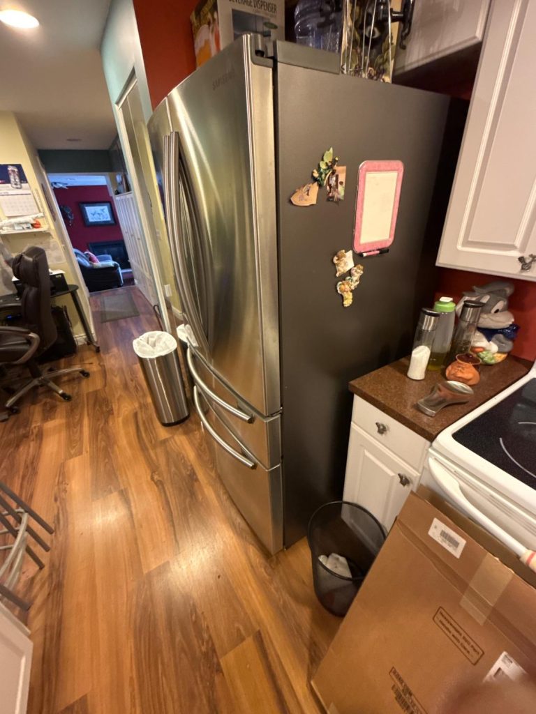 Samsung French door refrigerator installed in a Surrey, BC kitchen before defrost system repair