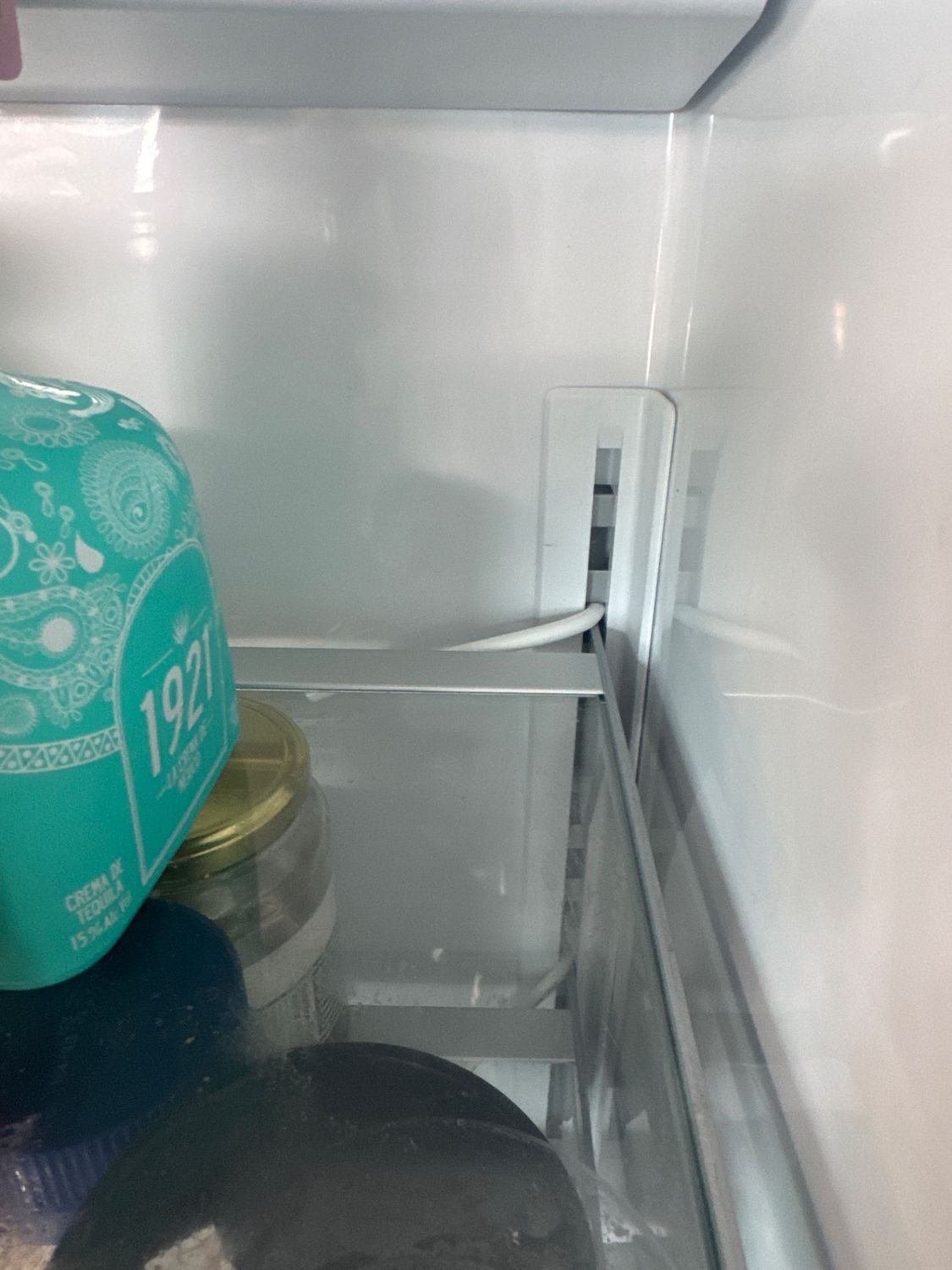 Air outlet and isolation door area inside a Fisher & Paykel built-in refrigerator during ice buildup diagnosis
